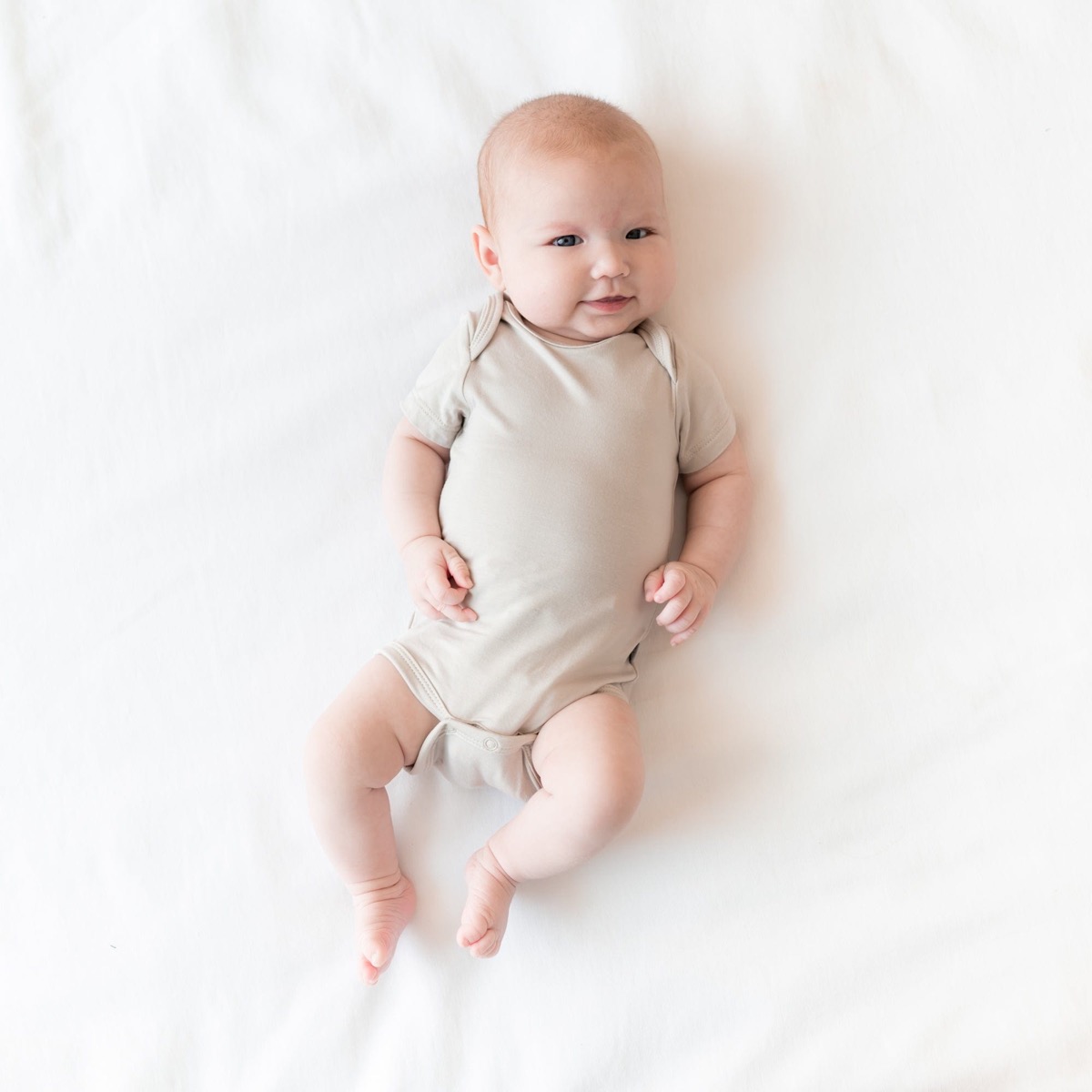Kyte Baby Bodysuit manga corta de rayón de bambú (recién nacido)
