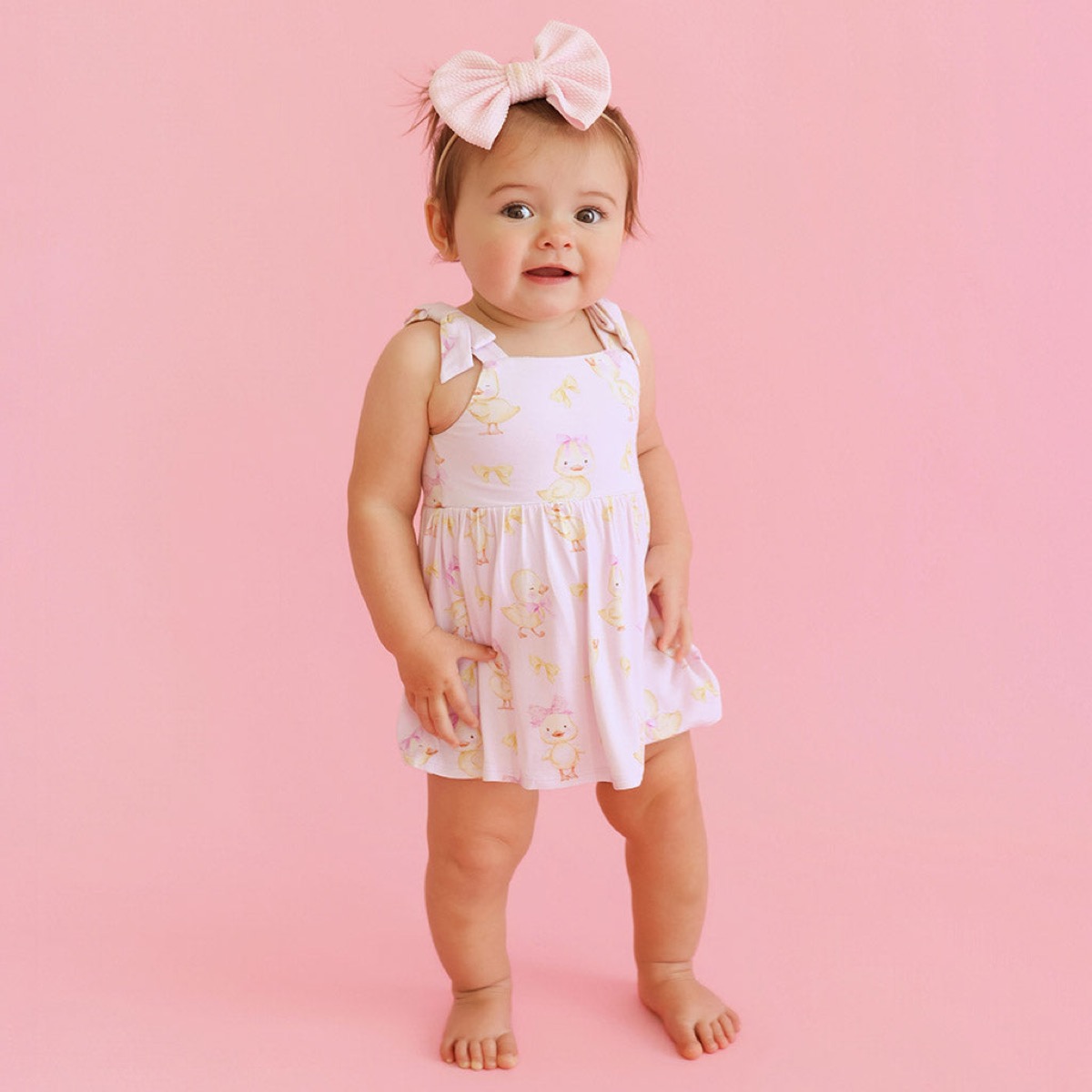 Posh Peanut Edwina Bow Babydoll Bodysuit Dress, rosa